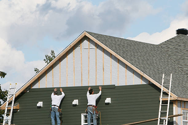 Professional Siding Repair technician working in Bloxom, VA